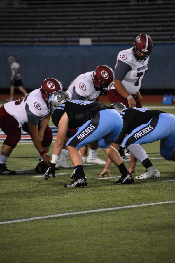 Football team playing against Springdale.