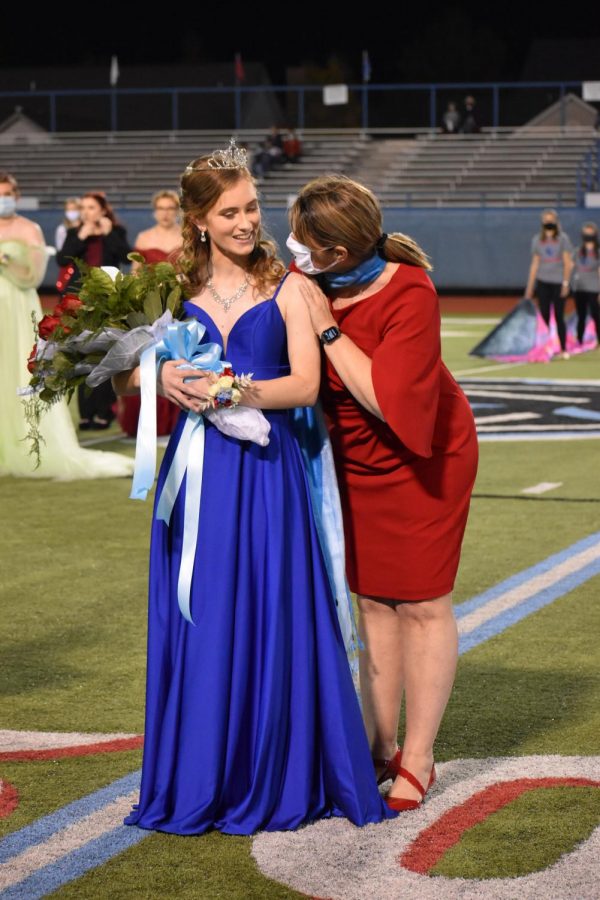 Dr. Miller crowns Anna Anders band queen.