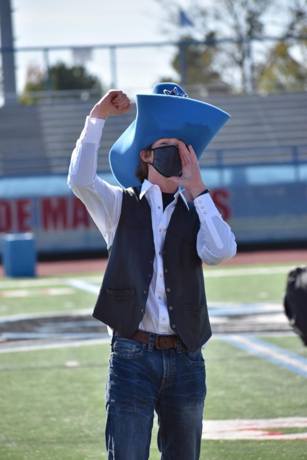 Mascot Braxton Waller hypes up crowd during virtual pep rally.