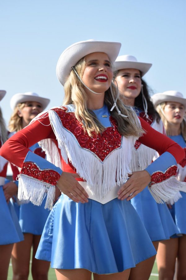 Senior Lieutenant Carsyn Lincks leads the Belles off the field during the Northside pep rally at Jim Rowland Stadium.