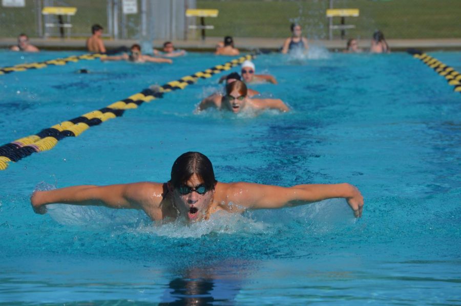 Leading the lane at swim practice on Sept. 8, sophomore Ian Maurer swam the butterfly stroke at Creekmore park’s outdoor pool. So far, my biggest achievement swimming for Southside is breaking a minute on a 100 meter freestyle,  Maurer said.