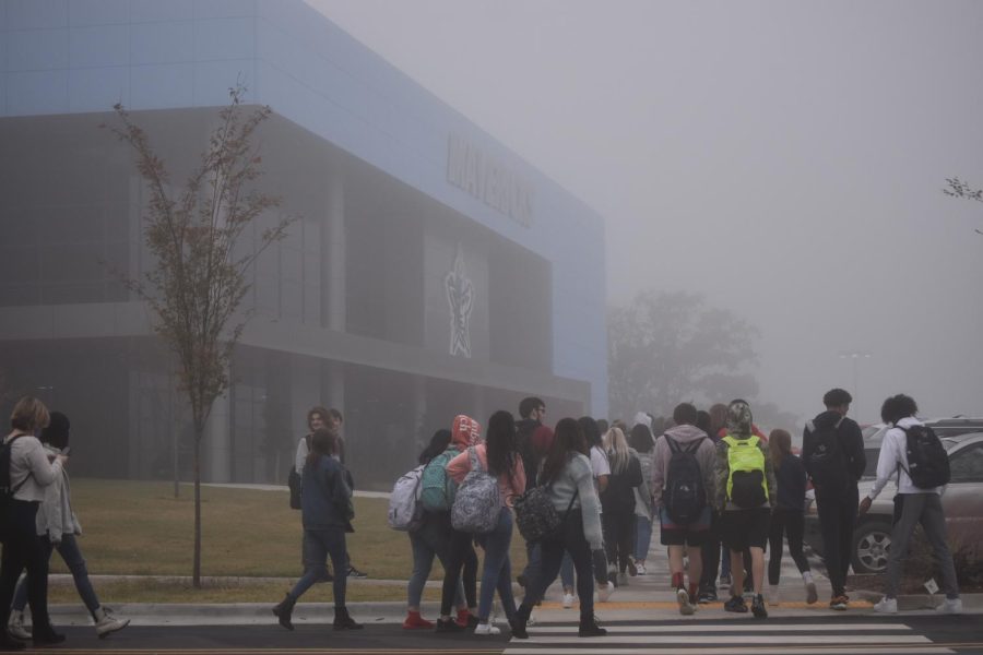 Fog settles around the new arena as students walk in for the first freshmen pep rally on Nov. 4.