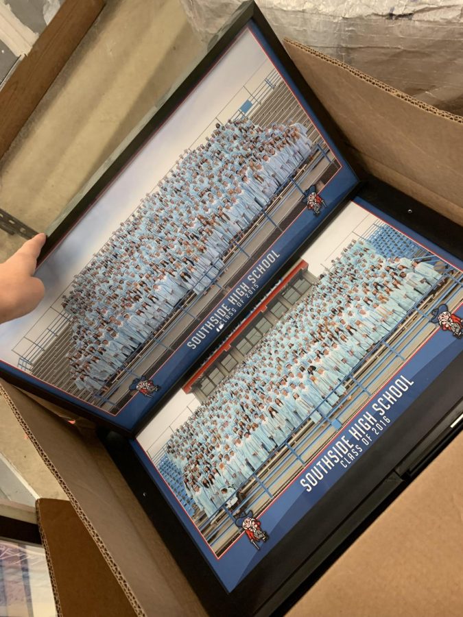 Class photos now reside in boxes in the activity center storage area.