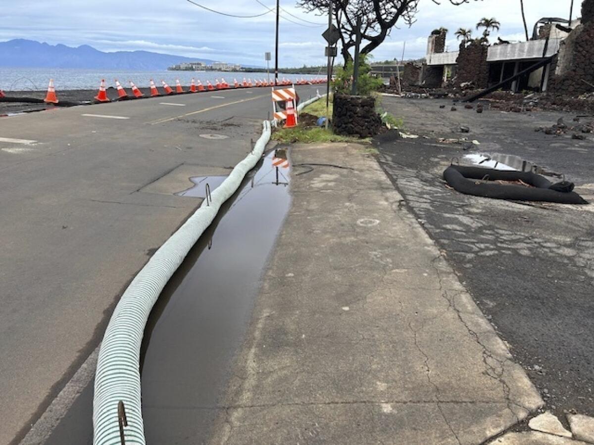 Officials from Maui attempt to stop ash from getting in the storm drains
