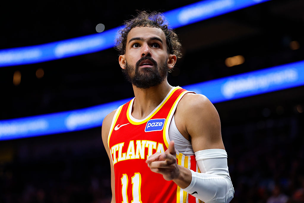 ATLANTA, GEORGIA - DECEMBER 27: Trae Young #11 of the Atlanta Hawks reacts during the third quarter against the New York Knicks at State Farm Arena on December 27, 2025 in Atlanta, Georgia. NOTE TO USER: User expressly acknowledges and agrees that, by downloading and or using this photograph, User is consenting to the terms and conditions of the Getty Images License Agreement. (Photo by Todd Kirkland/Getty Images)